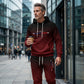 🔥 Komplett mit Hoodie & Hose — Mit Kängurutasche und Kordelzug am Bund. Perfekt für das Gym und die Straße!