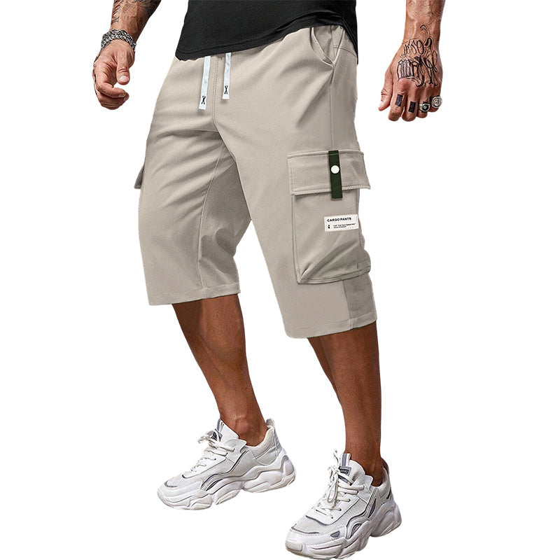 ✨🔥 Lässige 3/4-Cargo-Hose mit Kordelzug für Herren – ideal für urbane Abenteuer & warme Tage 🚀💪 Dank praktischer Taschen und lässigem Schnitt maximaler Komfort und Stil.